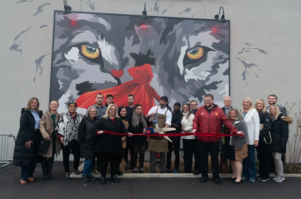 Ribbon cutting for Red and the Wolf in Clawson